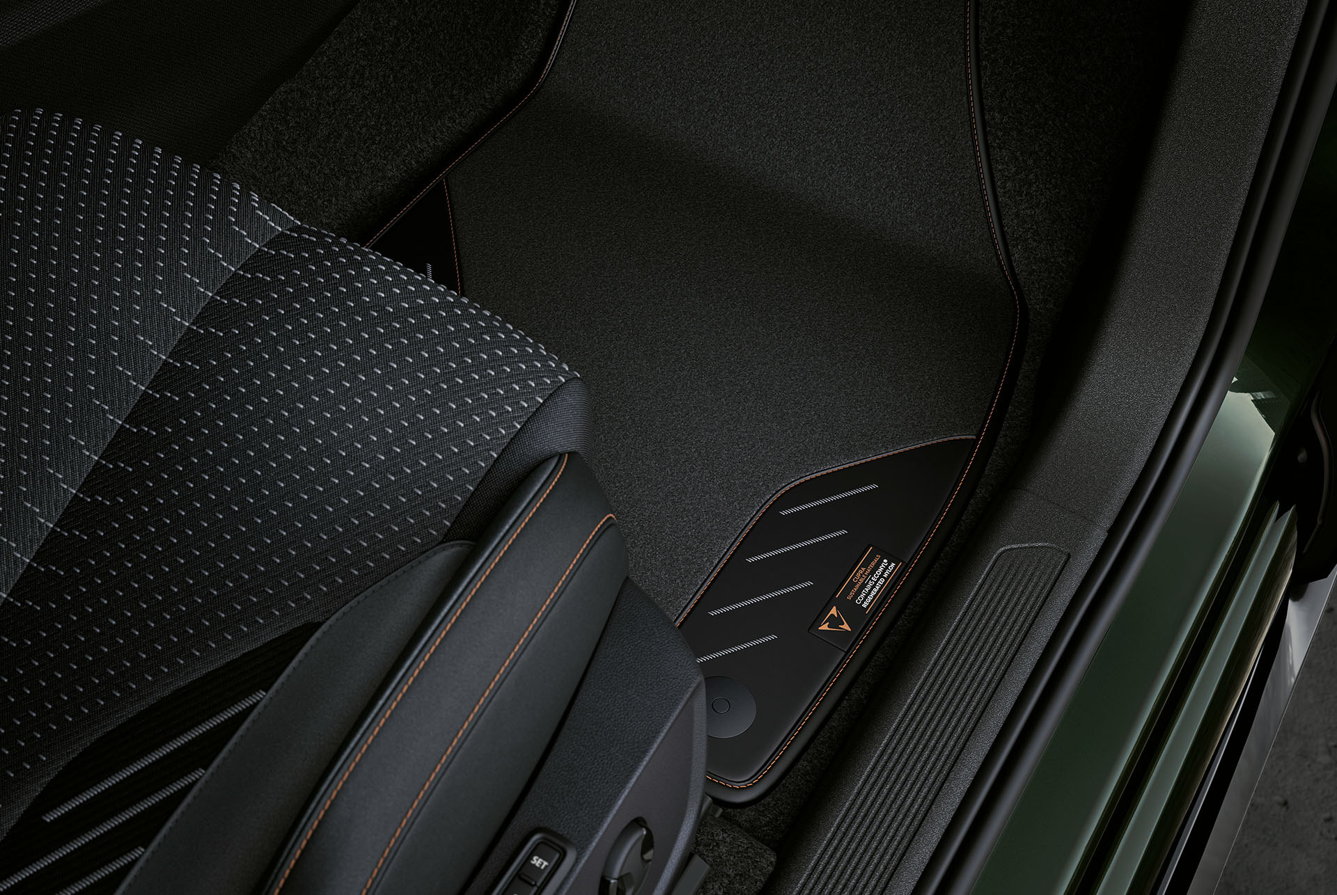 CUPRA Born interior view of the adrenaline floor mats