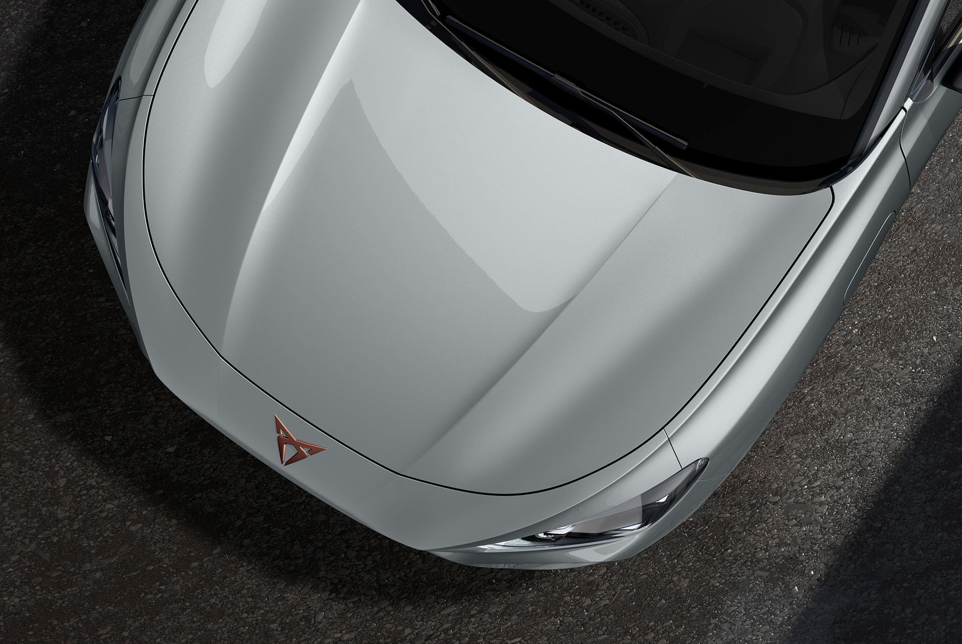 Cupra terramar, glacial white colour, top-down view of the front hood and headlights.