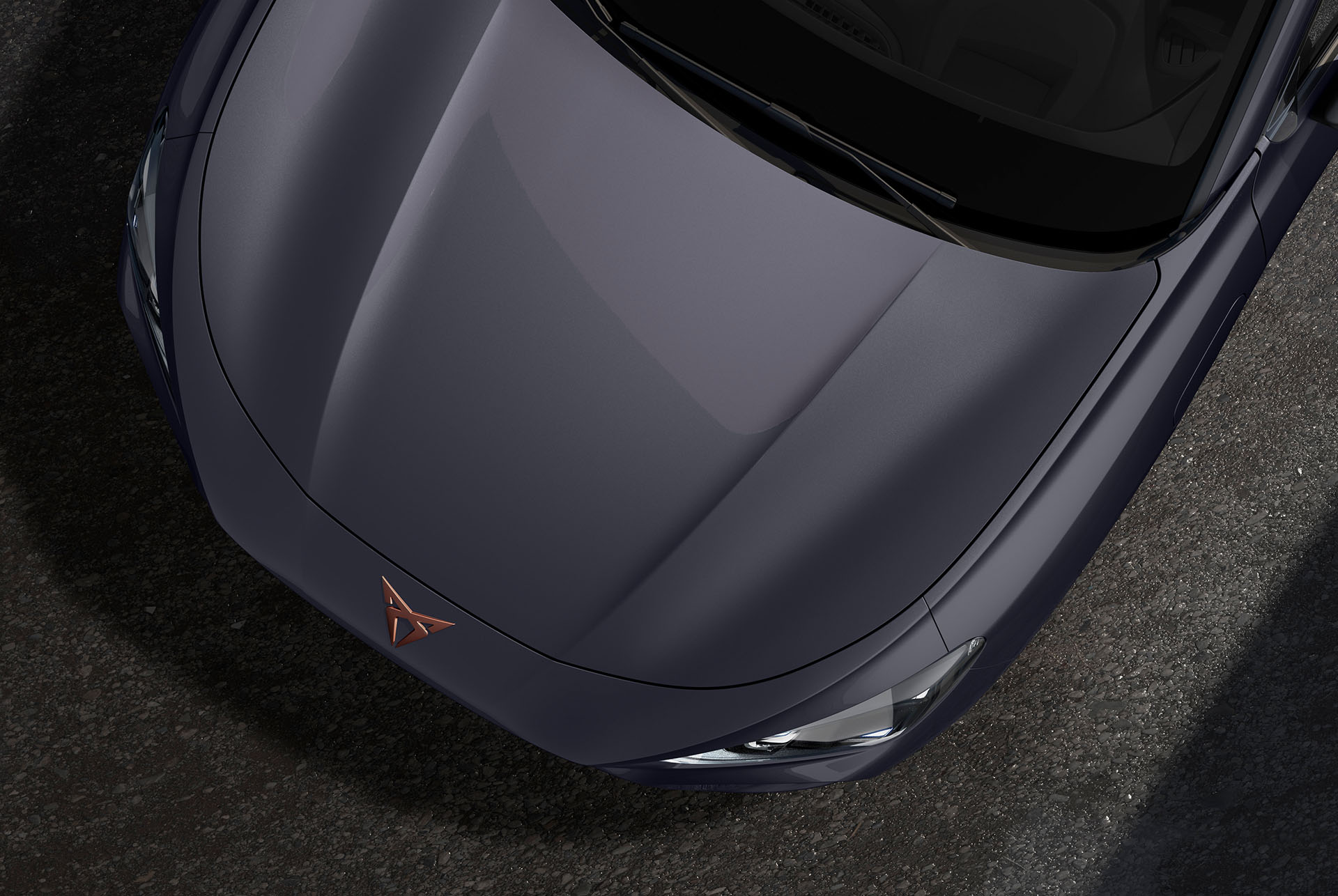 Cupra terramar, graphene grey colour, top-down view of the front hood and headlights.